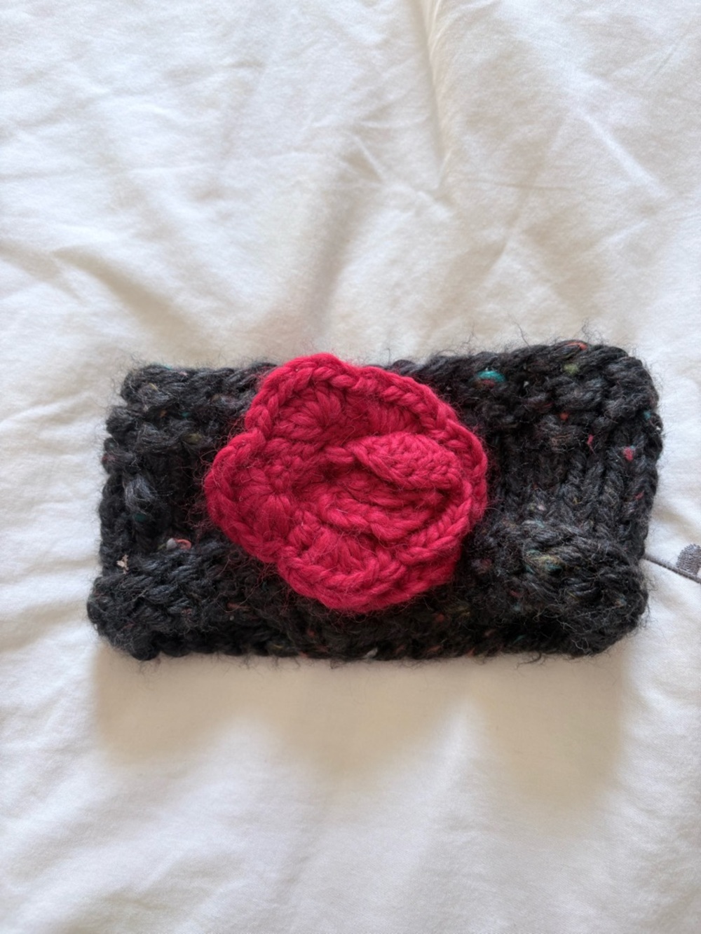 Handmade Black Knit Headband with Pink Flower Accent